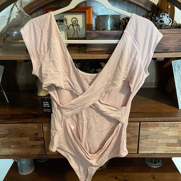 Express cross back body suit - Picture 3 of 5